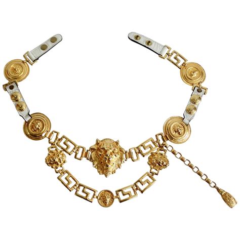 cintura versace lion|Unsigned Versace Lion Head Drop Chain Belt circa 1980’s .